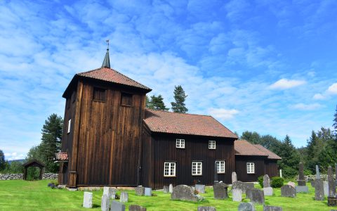 135 Viker Kirke from side with blue skies Ådal Ringerike